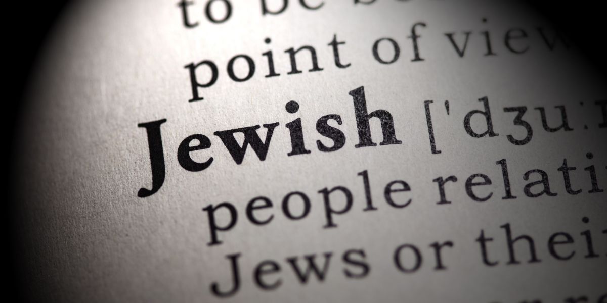 Jewish in bold letters on paper page.