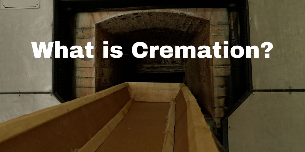 "What is cremation?". Crematory oven with cremation casket outside of it.